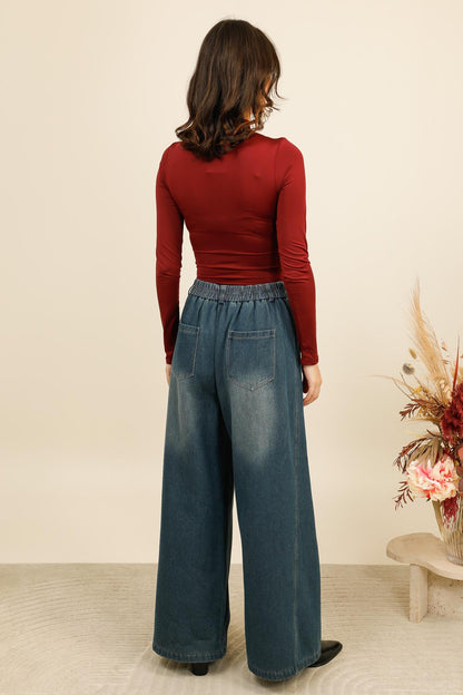 LYRA – Body ajusté à col montant avec détail bijou